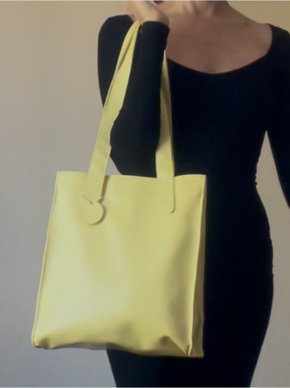 Nina Ricci parfums structured, minimalist yellow faux vegan leather tote bag
